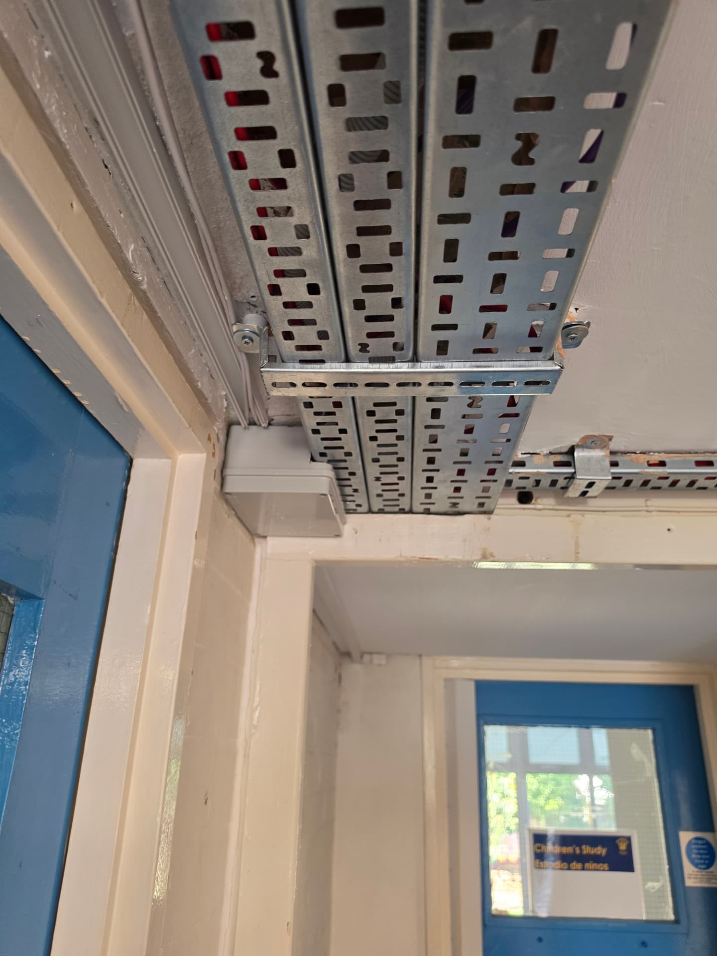 Detail of tray supports and brackets where the containment changes direction.
